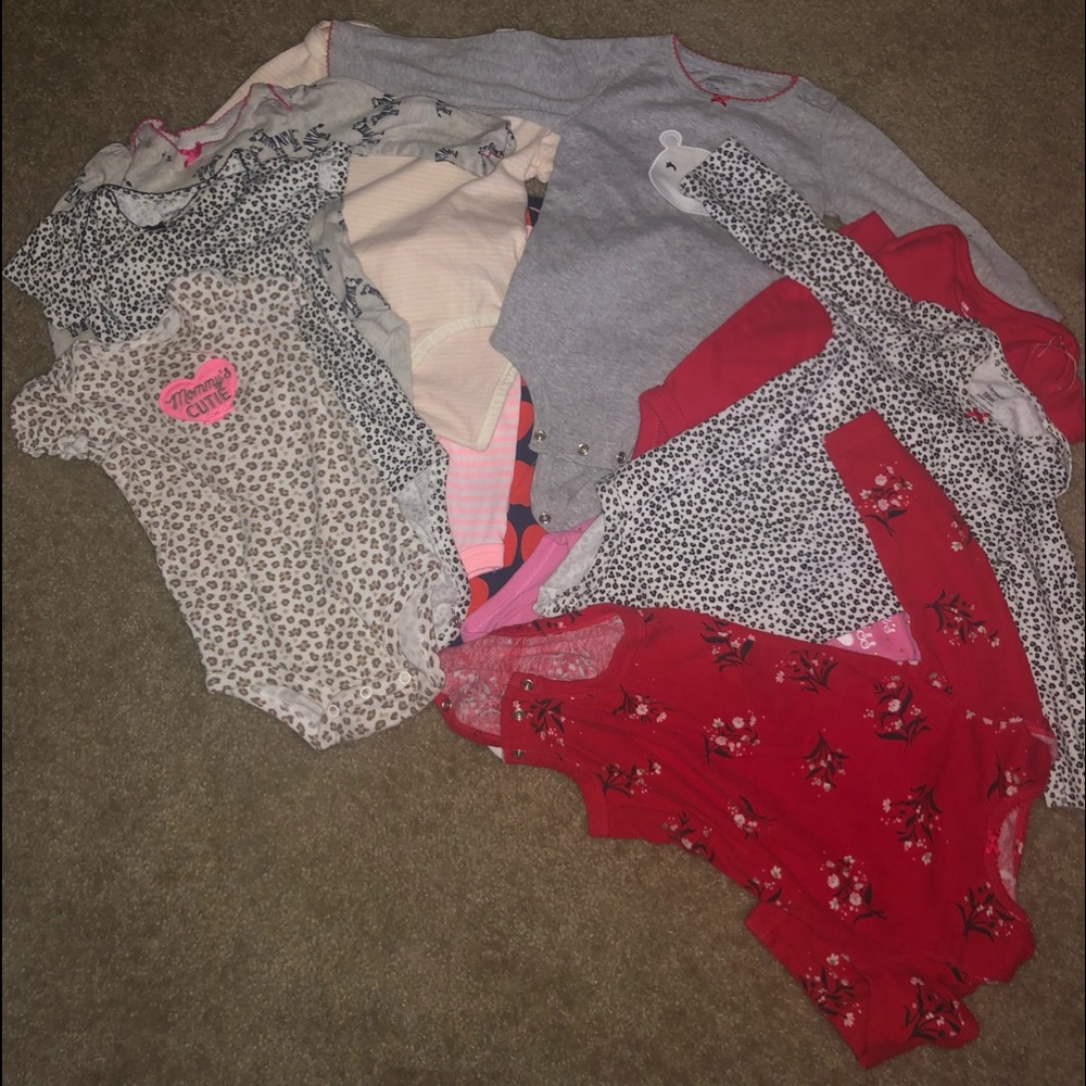 Bundle of long and short sleeved onesies.